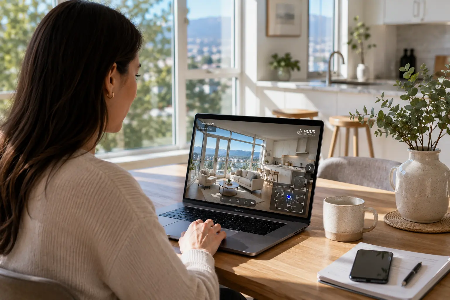 interactive property tours showing buyer exploring virtual home tour on laptop in bright daylight home setting